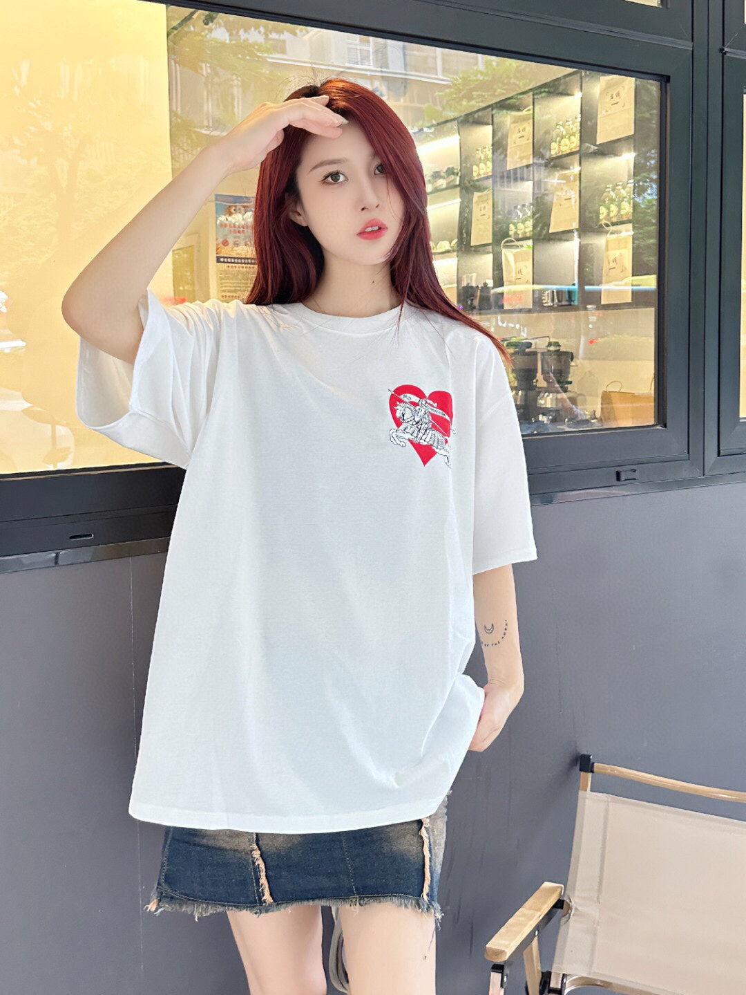 White T-Shirt with Heart and Skeleton Graphic