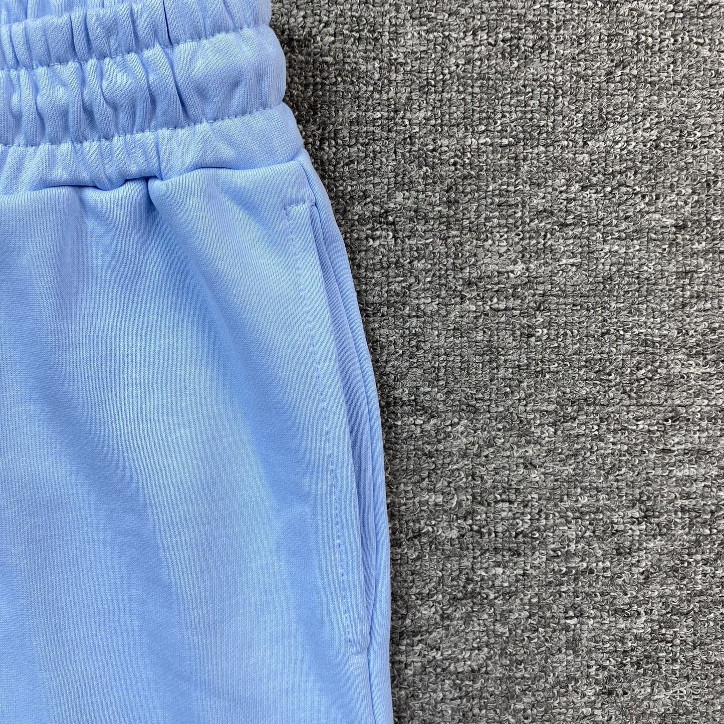 DENIM TEARS COTTON WREATH SWEATPANTS BABY BLUE